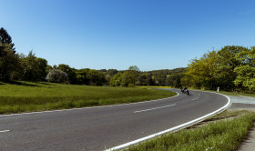 Stock Image: motorcyclist on country road