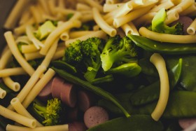Stock Image: noodles broccoli and sausages