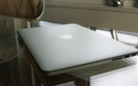 Stock Image: notebook on glass table