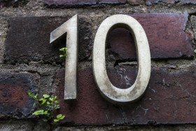 Stock Image: number 10 on a old wall