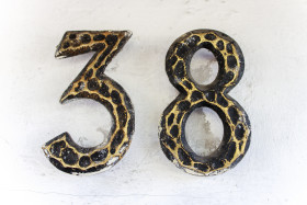 Stock Image: Number 38 on a house wall