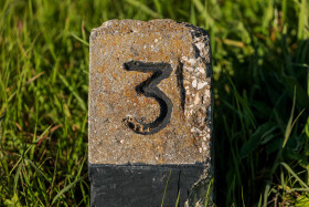 Stock Image: Number three (3) set in stone