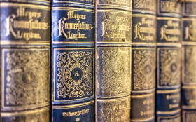 Stock Image: Old books in the library