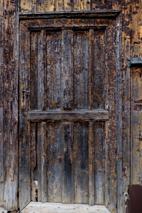 Stock Image: Old Deteriorated Wooden Door