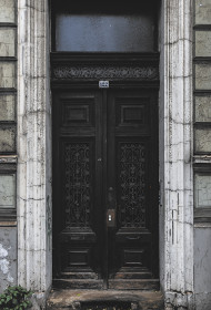 Stock Image: old door in a town texture
