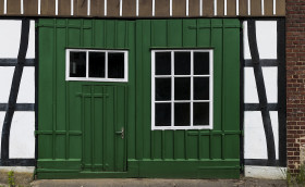 Stock Image: old green barn door