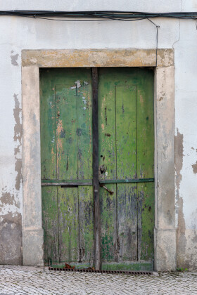 Stock Image: old green wooden door