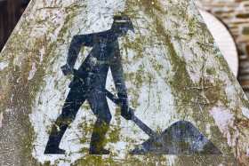 Stock Image: old  grunge and dirty under construction sign