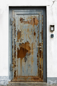 Stock Image: old rusty blue painted door texture bachground