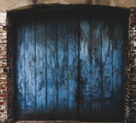 Stock Image: old weathered blue gate