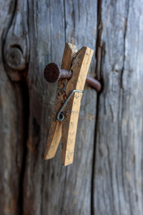 Stock Image: Old wooden clothes peg