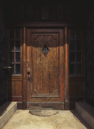 Stock Image: old wooden housedoor