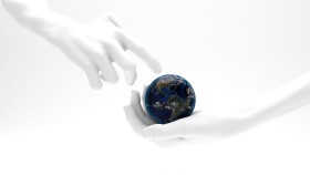 Stock Image: our planet earth in hands, isolated on white background