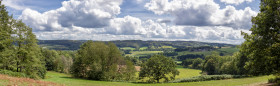 Stock Image: panorama of an german rural landscape with beautiful clouds in summer