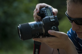 Stock Image: photographer hands on canon 5D