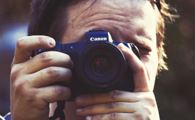 Stock Image: photographer with canon eos r