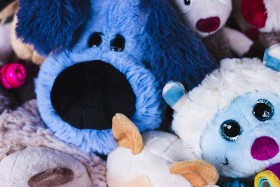 Stock Image: Pile of plush animals with dogs and teddies