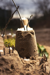 Stock Image: playing with sand building a castle