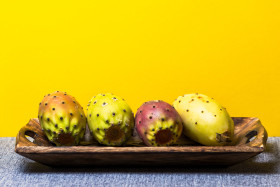 Stock Image: prickly pears yellow background