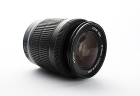 Stock Image: professional camera lens isolated on white background