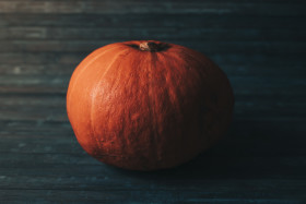 Stock Image: Pumpkin on wooden background