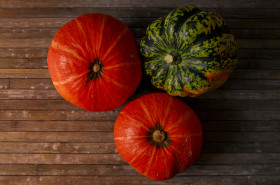 Stock Image: Pumpkins on wooden background