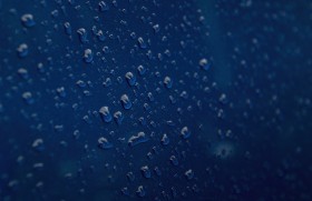 Stock Image: raindrops on blue carpaint