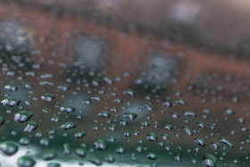 Stock Image: raindrops on green paint