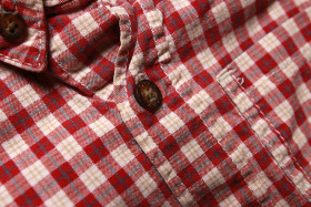 Stock Image: Red and white checked shirt for children