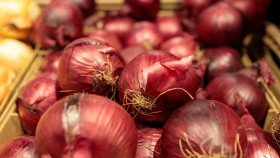 Stock Image: Red onions in the supermarket