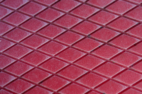 Stock Image: Red plastic lozenge background