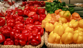 Stock Image: Red Yellow and Green Bell Peppers  on a market