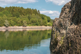 Stock Image: rock in lake - landscape in germany nrw wuppertalsperre