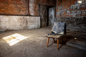 Stock Image: rotten chair in a lost place