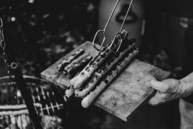 Stock Image: sausages are served from an outdoor grill