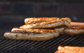 Stock Image: sausages on a grill grid