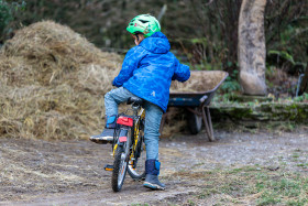Stock Image: Seven-year-old child on his bicycle