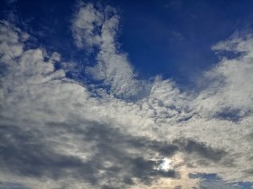 Stock Image: Sun behind Clouds Sky replacement Background