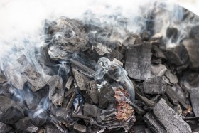 Stock Image: Smoking charcoal