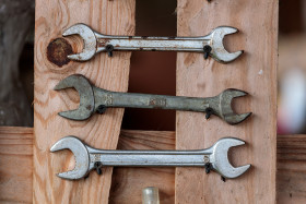 Stock Image: Spanners on a wooden wall