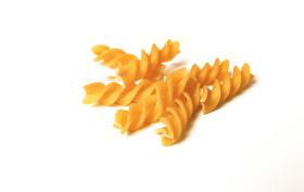 Stock Image: spiral pasta isolated on an white background