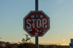 Stock Image: Stop sign full of stickers