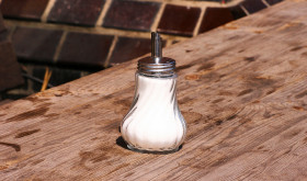 Stock Image: Sugar dispenser on a table