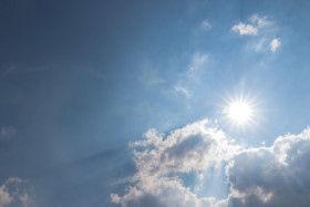 Stock Image: sun blue sky clouds