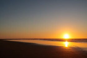 Stock Image: Sunset at the atlantic ocean in Portugal, Nazare