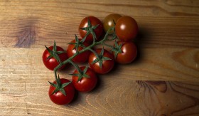 Stock Image: tomatoes on a wooden board