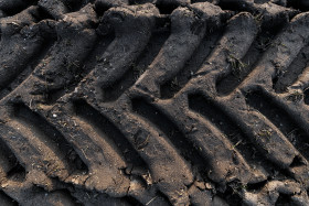 Stock Image: Tractor tracks in the mud texture