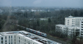 Stock Image: Train runs through the snow