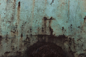 Stock Image: turquoise painted rusty metal texture