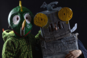 Stock Image: Two children dressed as robots and dragons for carnival